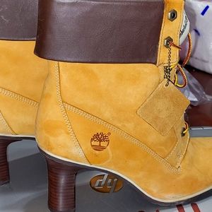 Stacked heel ankle high boots